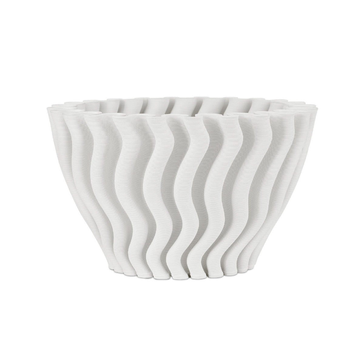 White ceramic bowl with wavy design on a white background