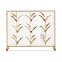 A decorative fireplace screen with a gold-toned metal frame and leafy branch motif over a white textured mesh background, shown on a clean white studio background.