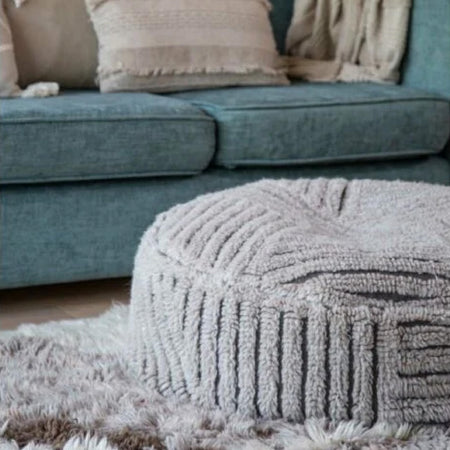 textured gray floor pouf 