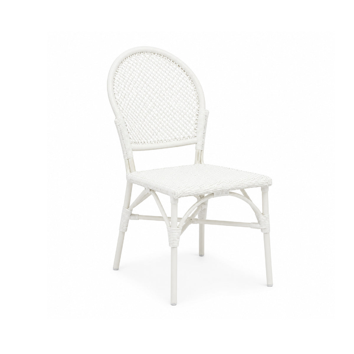 The Donovan White Faux Rattan Indoor/Outdoor Chair by Made Goods features a rounded back and woven seat, perfect for patios.