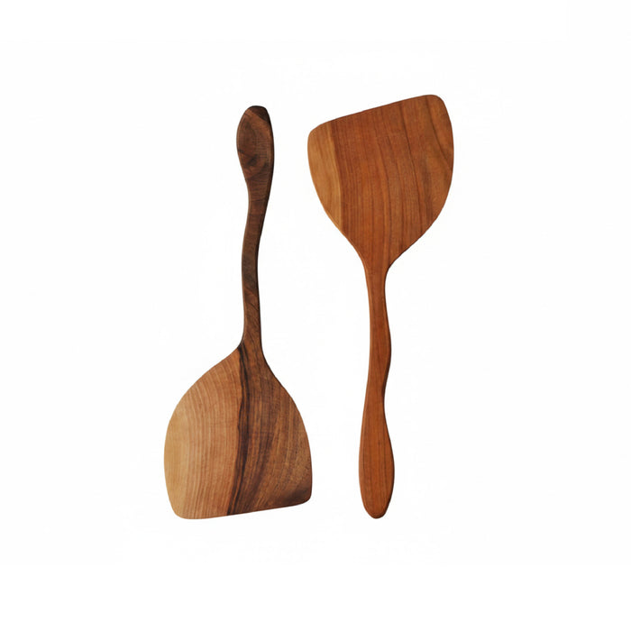 Two wooden spatulas on a white background