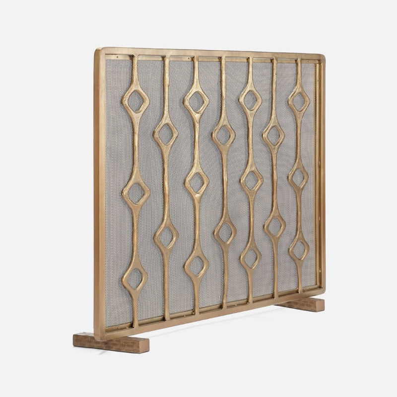 The Made Goods Webster Antique Brass Fireplace Screen features geometric diamonds and mesh, perfect for your hearth.