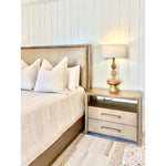 carved wood table lamp nightstand bed throw pillows