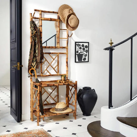 natural foyer coat rack with black floor vase 