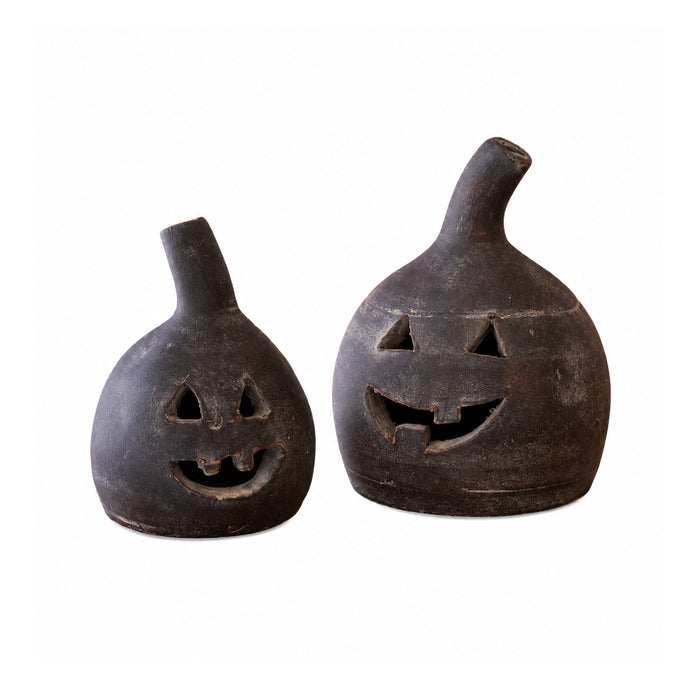 Kalalou Small Black Clay Jack-O-Lanterns (set of 2)—handcrafted Halloween decor with smiling faces and tilted stems.