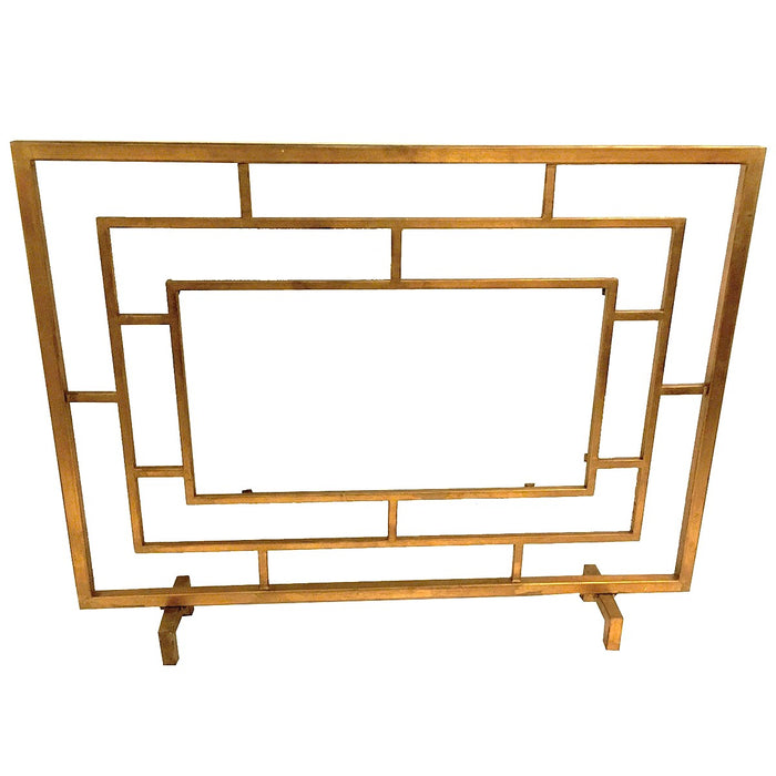 The Dessau Home Center Panel Glass Antique Gold Fireplace Screen is a chic geometric accessory for contemporary fireplaces.