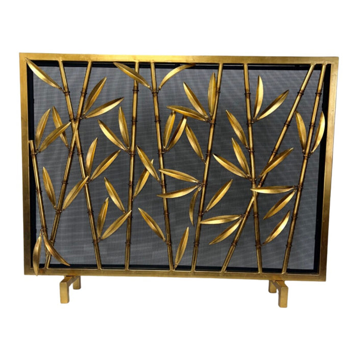 Dessau Home's Antique Gold Bamboo Fireplace Screen features bamboo branches on black mesh.