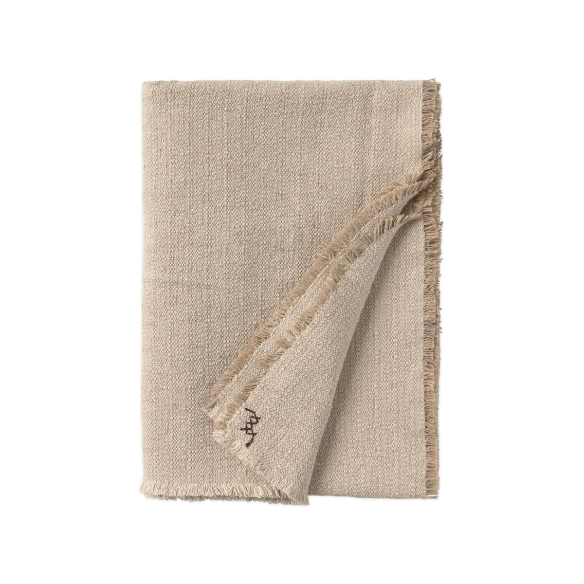 A folded beige woven throw blanket with fringed edges, shown on a plain white background.