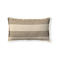 A rectangular throw pillow with horizontal stripes in beige, taupe, and brown, featuring a frayed fringe edge, shown on a plain white background.