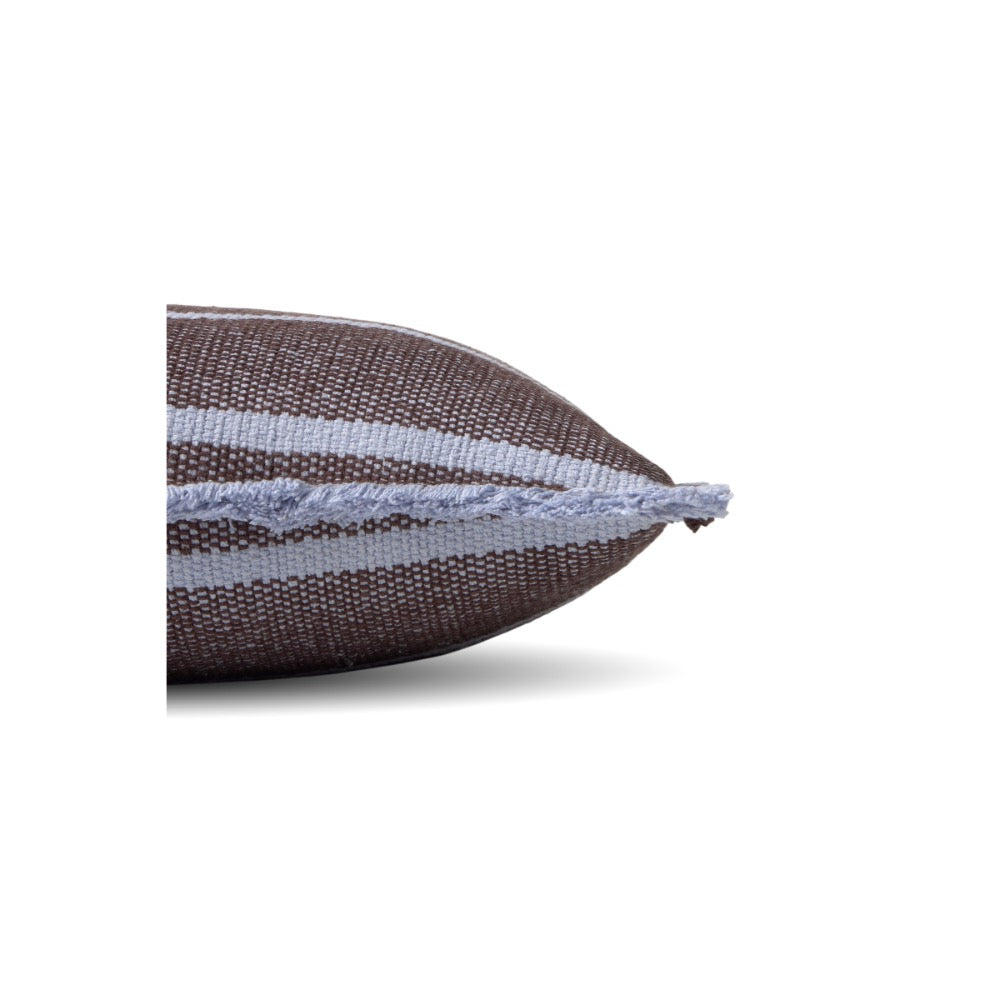 A close-up of a woven throw pillow corner showing a dark brown and light gray striped pattern with a frayed edge, set against a plain white background.