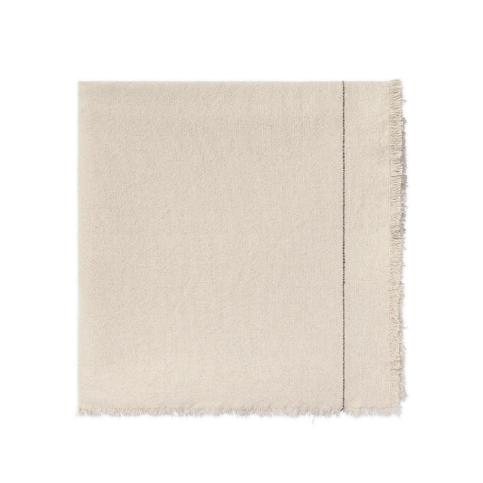 A square cream-colored woven tablecloth featuring a single vertical stitched seam and fringed edges, shown flat against a solid white background.