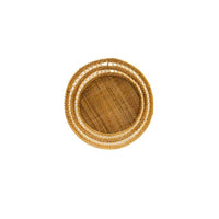 Round woven rattan wall basket
on a white background
