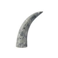 Gray stone horn on a white background