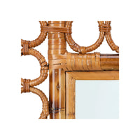 Close-up of a decorative mirror with a rattan frame on a white background