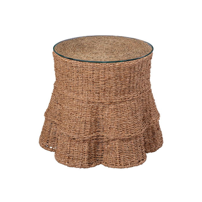 Woven side table with glass top on a white background