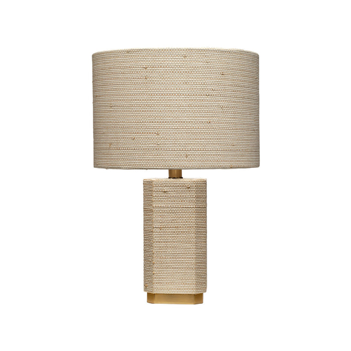 Beige table lamp with woven design on a white background