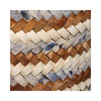 Close-up of a woven pattern with wooden and stone-like tiles.