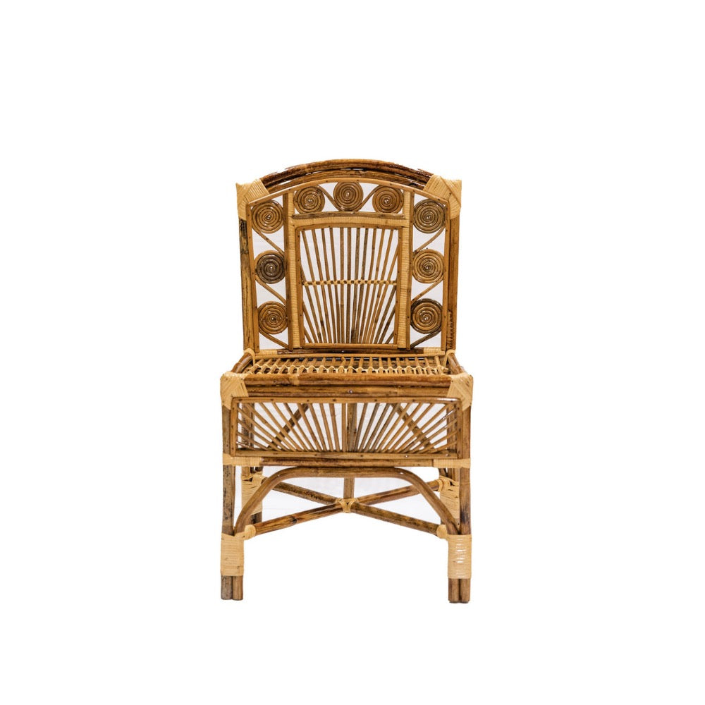 Wicker chair with decorative backrest on a white background