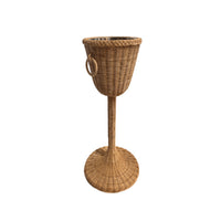 Wicker champagne stand on a white background