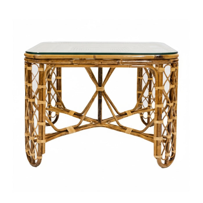 Rattan table with a glass top on a white background