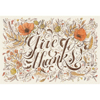 The Hester & Cook Give Thanks Paper Placemats Pad features autumn leaves and script—ideal for Thanksgiving table decor.