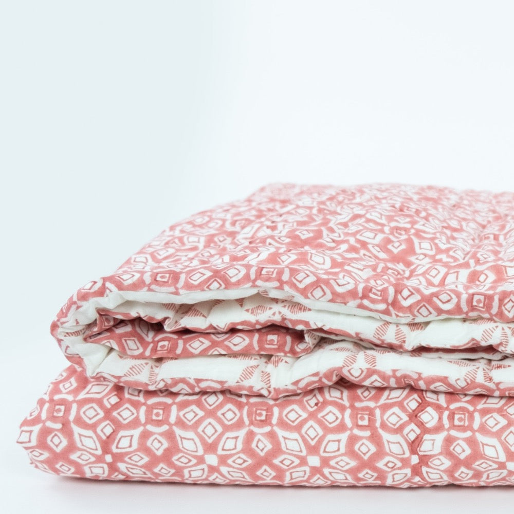 coral white geometric block printed quilt 