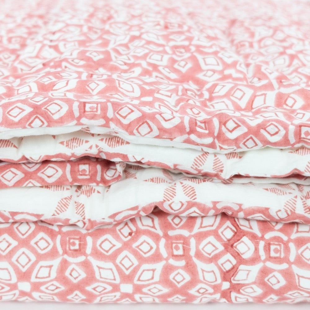 coral white geometric block printed quilt 