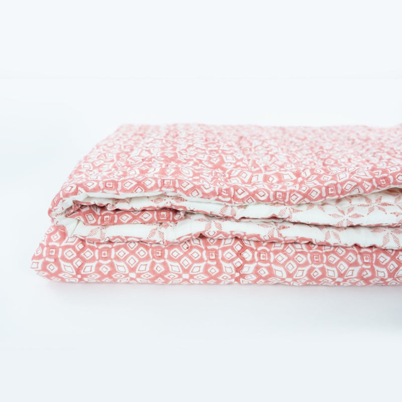 coral white geometric block printed quilt 