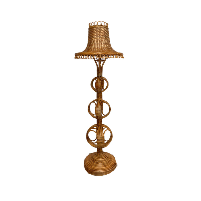 Wicker lamp with a decorative base on a white background