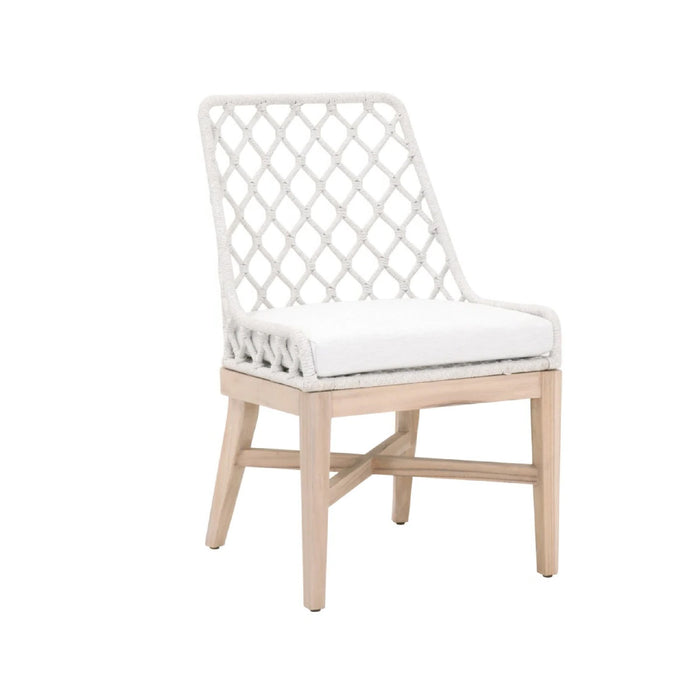 The Lattis Indoor/Outdoor Side Chair by Essentials for Living features a woven back, cushioned seat, and light wood legs.