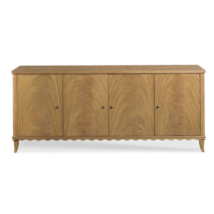 The Lela Scalloped Edge Cabinet by Woodbridge Furniture features four doors, curved legs, and a classic elegant design.