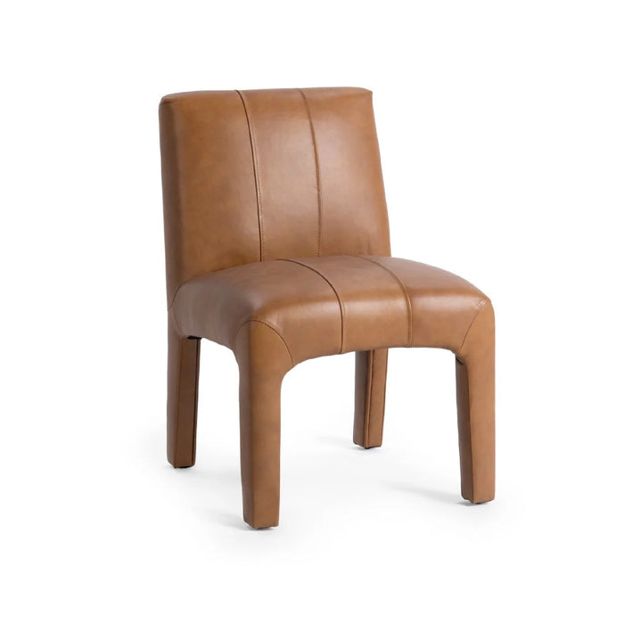 Liliana Tan Leather Dining Chair by Classic Home, featuring a wide seat and backrest, on a plain white background.