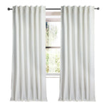 white linen curtain panels with white vertical stripes