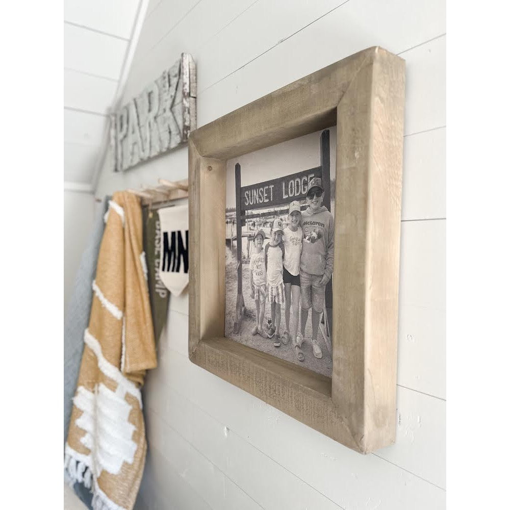 timberwood frame photo styled on wall