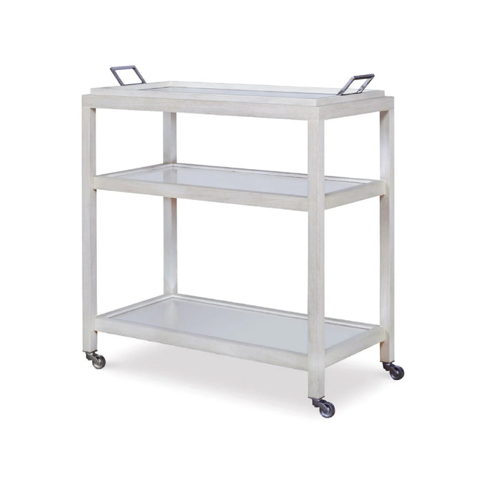 The Mandalay White Bar Cart by Century Furniture is a three-tier, light wood modern cart with metal handles and wheels.