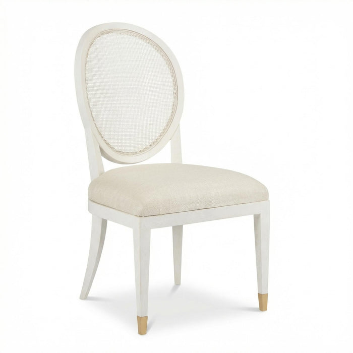White chair with beige cushion on a white background