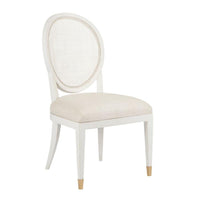 White chair with beige cushion on a white background