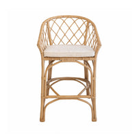 Phillips Scott Maui Rattan Counter Stool with curved backrest and white cushion, shown on a white background.