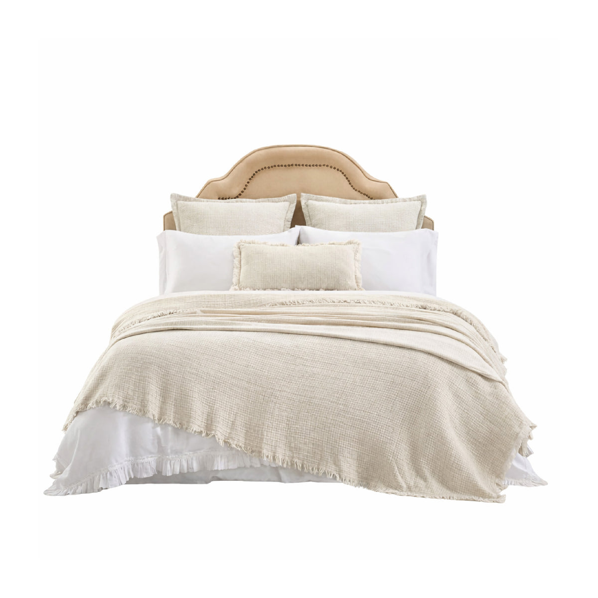 The Monroe Beige Bedding Collection by Orchids Lux Home features beige and white bedding, a neutral throw, and a tan headboard.