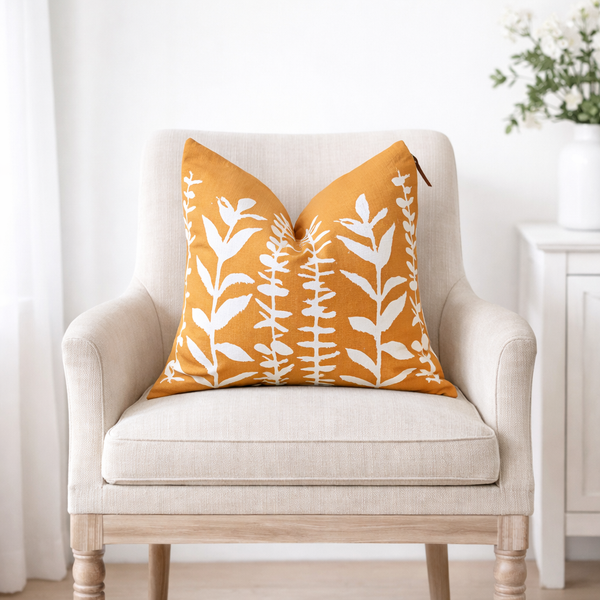 square pillow mustard linen white eucalyptus branches 