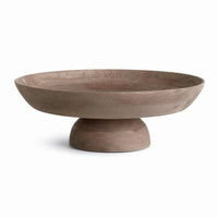Wooden bowl with a pedestal base on a white background