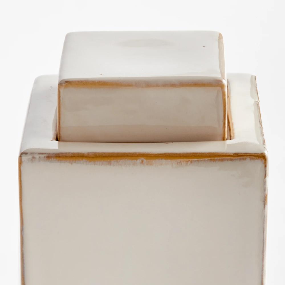 lidded cream color rectangular jar 