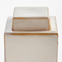 lidded cream color rectangular jar 