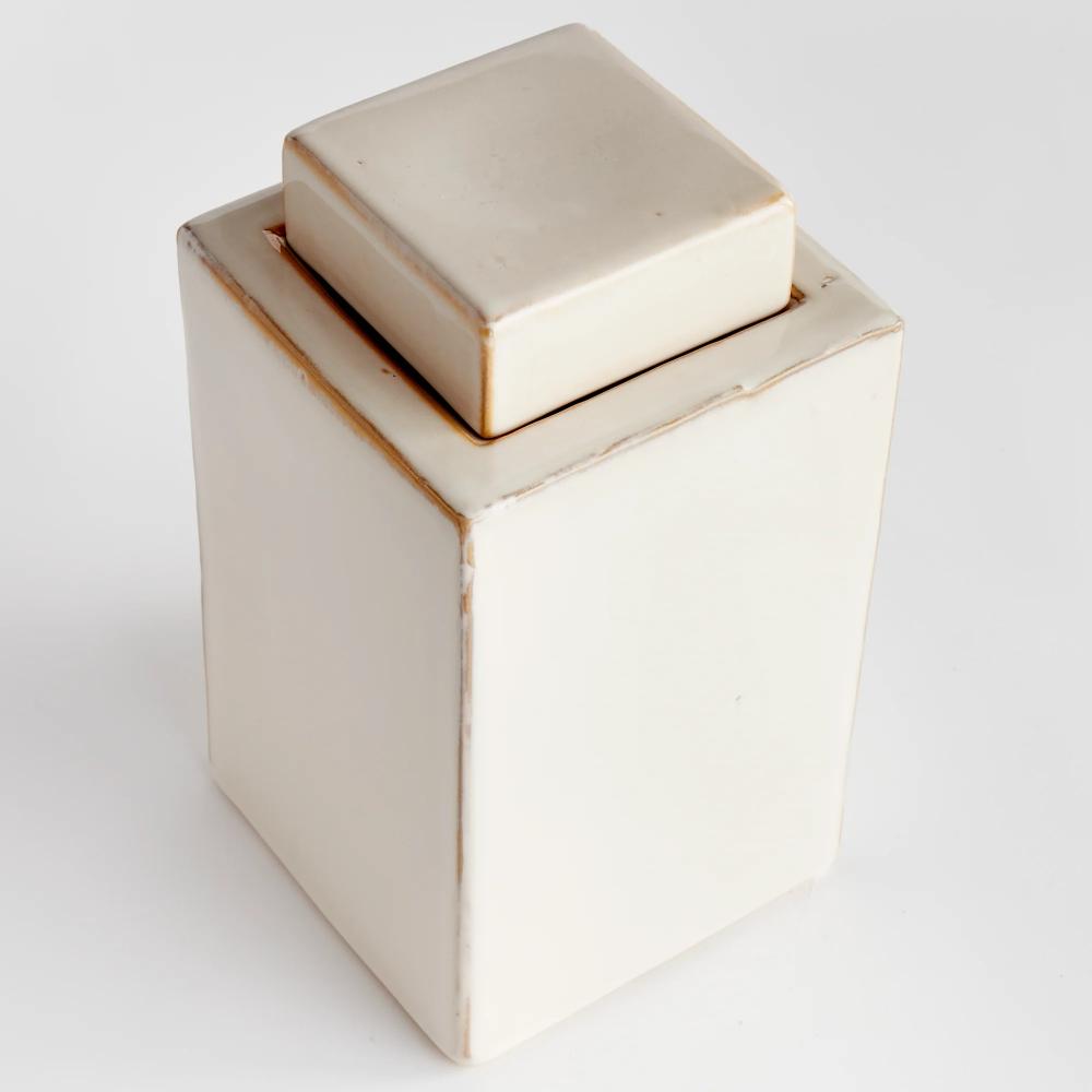lidded cream color rectangular jar 