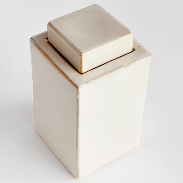 lidded cream color rectangular jar 