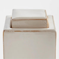 lidded cream color rectangular jar