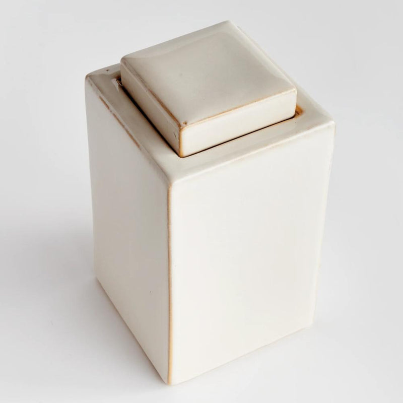 lidded cream color rectangular jar