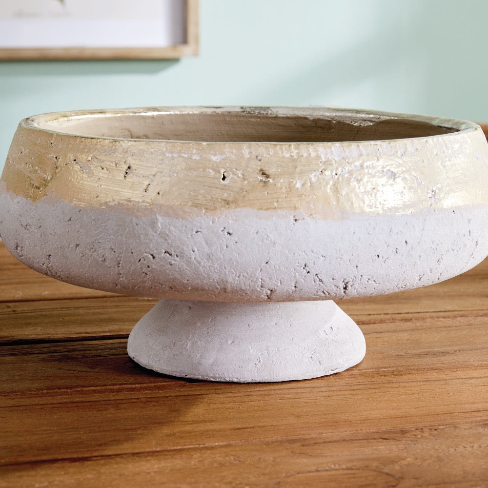 Decorative bowl with a textured surface on a wooden surface