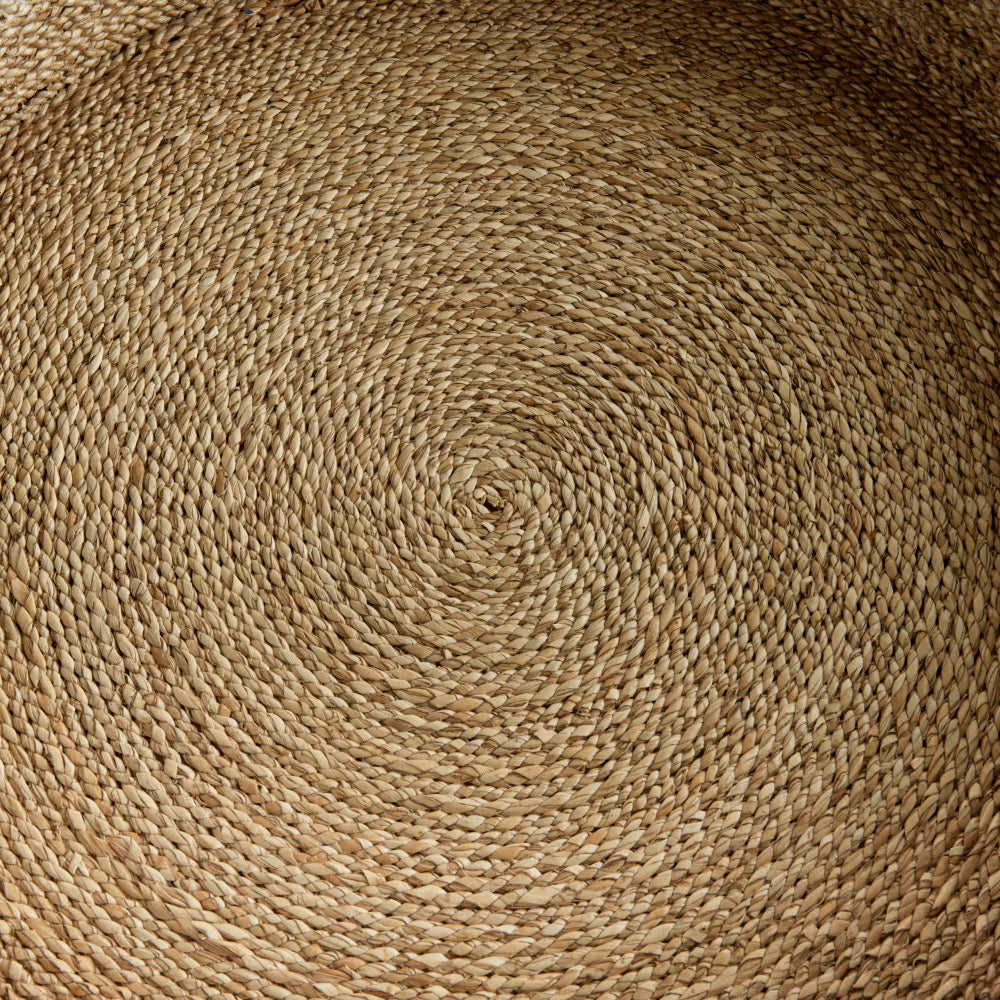 Close-up of a woven segrass with a circular pattern