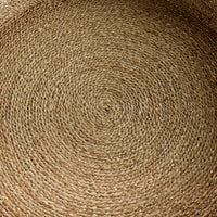 Close-up of a woven segrass with a circular pattern